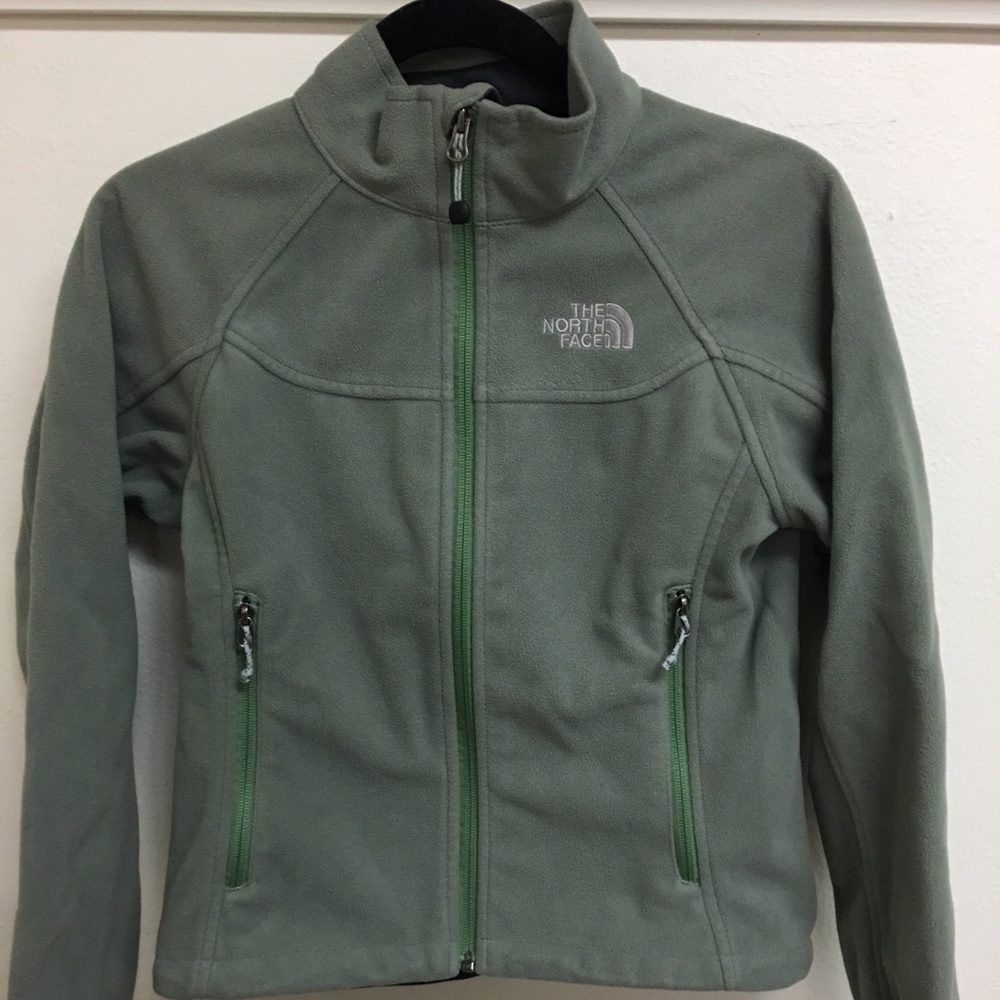 The North Face green jacket.